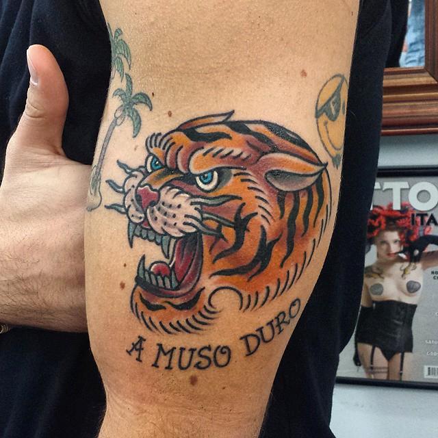 old school traditional tiger tattoo by Marco Biondi TattooNOW
